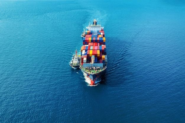 Free Photo _ Aerial view of cargo ship with cargo container on sea